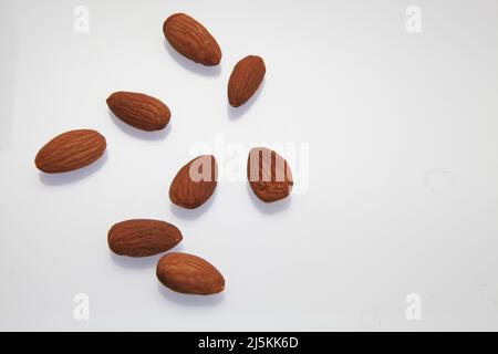 Almonds against a white background April 2022 Stock Photo