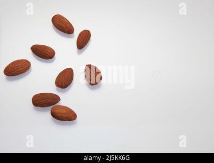 Almonds against a white background April 2022 Stock Photo