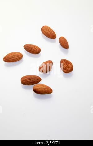 Almonds against a white background April 2022 Stock Photo