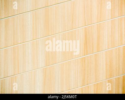Wood wall texture background with bright brown wood planks with diagonal patterns. Stock Photo
