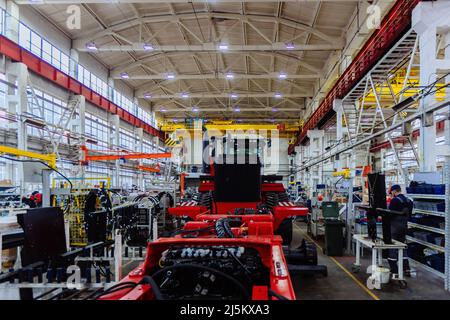 Assembly process of agricultural tractors in industrial workshop Stock Photo