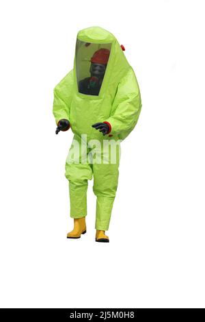 person inside the protective suit against contamination and chemical risk who breathes with the mask to filter the toxic and polluted air Stock Photo
