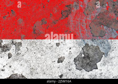 Indonesia flag on a damaged old concrete wall surface Stock Photo