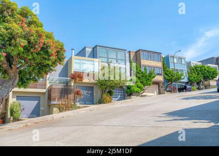 Sloped neighborhood land in San Francisco, California with complex box houses Stock Photo