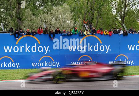 Italian fans take every vantage place to watch Ferrari's Charles le Clerc during the Emilia Romagna Grand Prix at the Autodromo Internazionale Enzo e Dino Ferrari circuit in Italy, better known as Imola. Picture date: Sunday April 24, 2022. Stock Photo