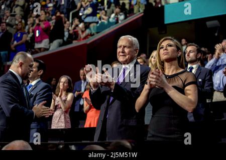 CLEVELAND, OHIO - JULY  18, 2016  Senator Orrin Hatch (R-UT) and Amber Smith (US army Chief Warrant Officer) helicopter pilot and now Trump campaign press secretary in the family section of the Quicken Arena opening night of the Republican National Convention Stock Photo