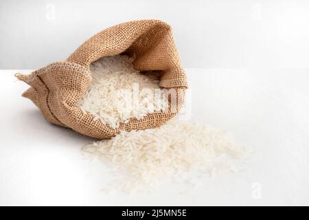 White rice in a hessian bag Stock Photo
