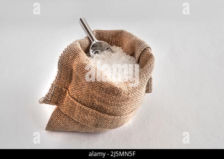 White rice in a hessian bag Stock Photo