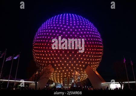 Lake Buena Vista, Florida, March 09, 2022: Nighttime view of the geodesic sphere at the entrance of Walt Disney World's Epcot Center. Stock Photo