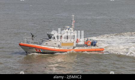 NEW YORK HARBOR – April 24, 2022: A United States Coast Guard vessel is seen in New York Harbor. Stock Photo