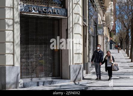 Madrid, Spain. 26th Apr, 2022. Pedestrians walk past the French