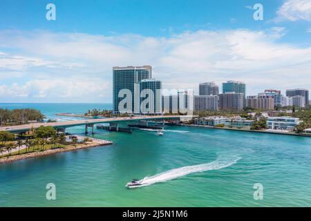 Boat cruising through Biscayne Bay by Bal Harbour in Miami Florida Stock Photo