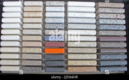 Luxury marble natural stone slabs for kitchen countertops and floor tiles. Samples of stone for countertops. Banner Stock Photo