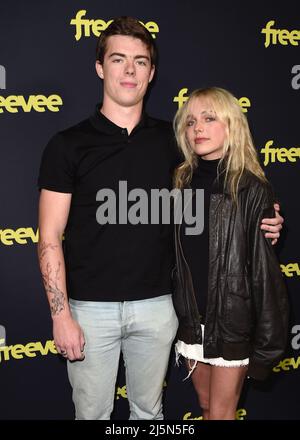 Eamonn Welliver and Cora Welliver walking on the red carpet at the