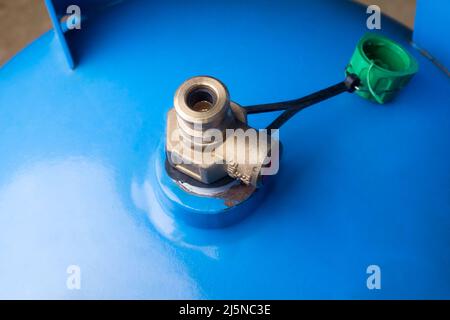 closeup of a domestic LPG gas cylinder valve, used in for cooking in the home kitchen Stock Photo