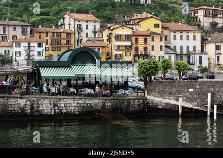 Cafe by Lake Como in the village of Argegno in Northern Italy Stock Photo