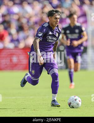 Orlando, FL:  Orlando City forward Facundo Torres (17) dribbles the all up the pitch during an MLS game against the New York Red Bulls, Sunday, April Stock Photo