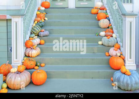 Pumpkins on every steps of the stairs as a holloween decorations at San Francisco, California Stock Photo