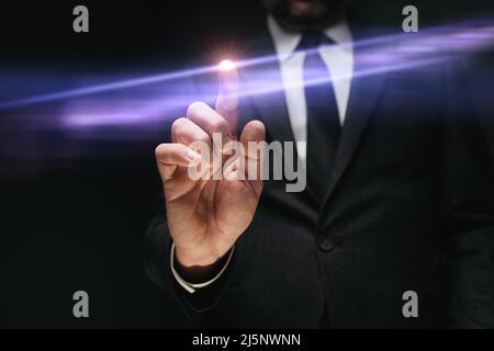 Businessman tapping virtual screen, modern futuristic and innovative technology concept, selective focus Stock Photo