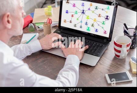 Social network concept shown on a laptop screen Stock Photo