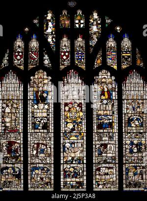 The 1848 restoration of the medieval window in St Andrew's church, Greystoke, Cumbria, UK Stock Photo