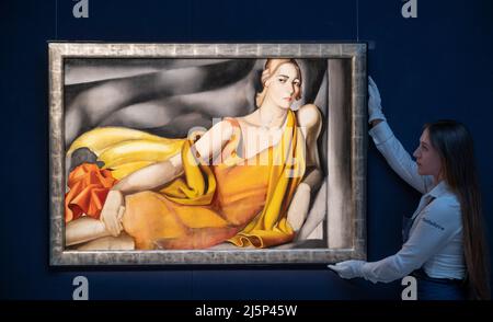 Sotheby’s, London, UK. 25 April 2022. Preview of major auction highlights in a travelling exhibition from The New York Modern day and evening sales to take place on 17-18 May 2022. Image: Tamara de Lempicka, Femme a la Robe Jaune, 1929, estimated in the region of $5 Million - 7 Million. Credit: Malcolm Park/Alamy Live News Stock Photo