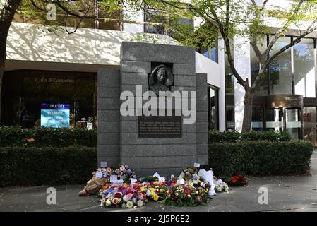 Australian Nurses Memorial Centre on St Kilda Rd, with flowers arrayed in front of the monument following ANZAC Day commemorations earlier in the day Stock Photo