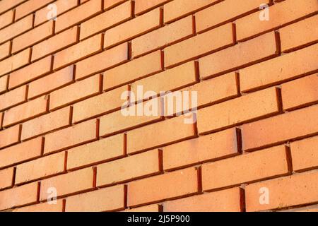 Brick wall with red and orange tones at San Francisco, California Stock Photo