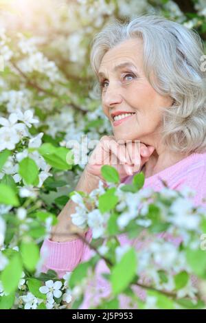 senior woman posing in park Stock Photo - Alamy