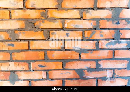 Saturated bright background from a freshly laid brick wall Stock Photo