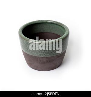 Beautiful small flower pot made of ceramic on white background. Stock Photo