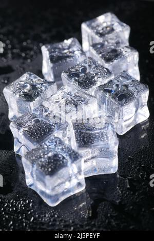 close up of many ice cubes on black background  Stock Photo