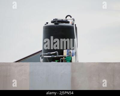 Water tank or water container to supply water into the house Stock Photo