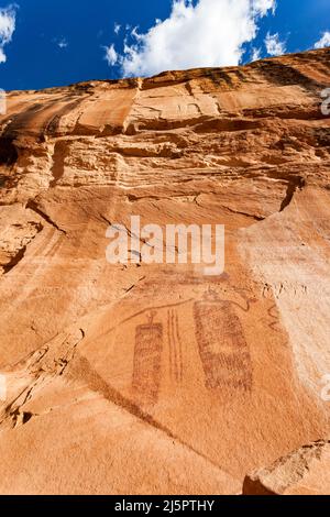 The Snake Man Pictograph Panel is located high on a sandstone wall in Seven Mile Canyon near Moab, Utah.  The paintings were done in the Barrier Canyo Stock Photo