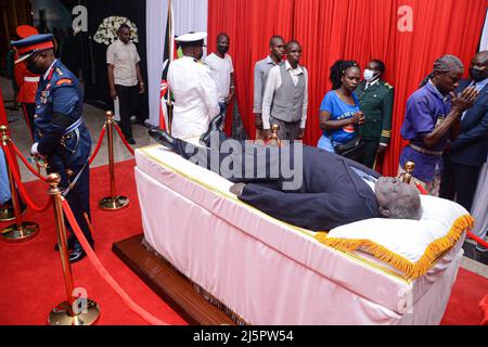 Nairobi, Kenya. 25th Apr, 2022. (EDITORS NOTE: Image depicts death) Members of the public view the body of the late president Mwai Kibaki, lying-in-state at Parliament Buildings in Nairobi. The 90 year old former head of state died on February 22, 2022 as announced by the current president Uhuru Kenyatta. Credit: SOPA Images Limited/Alamy Live News Stock Photo