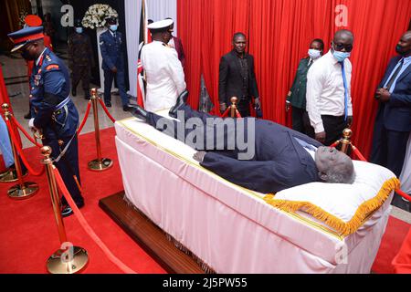 Nairobi, Kenya. 25th Apr, 2022. (EDITORS NOTE: Image depicts death) Members of the public view the body of the late president Mwai Kibaki, lying-in-state at Parliament Buildings in Nairobi. The 90 year old former head of state died on February 22, 2022 as announced by the current president Uhuru Kenyatta. Credit: SOPA Images Limited/Alamy Live News Stock Photo
