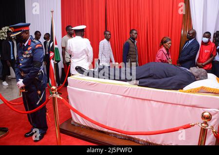 Nairobi, Kenya. 25th Apr, 2022. (EDITORS NOTE: Image depicts death) Members of the public view the body of the late president Mwai Kibaki, lying-in-state at Parliament Buildings in Nairobi. The 90 year old former head of state died on February 22, 2022 as announced by the current president Uhuru Kenyatta. (Photo by John Ochieng/SOPA Images/Sipa USA) Credit: Sipa USA/Alamy Live News Stock Photo