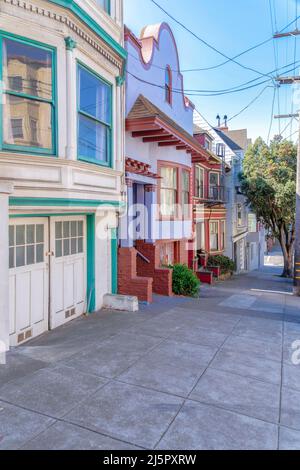 Row of townhouses on a sloped area at San Francisco, California Stock Photo