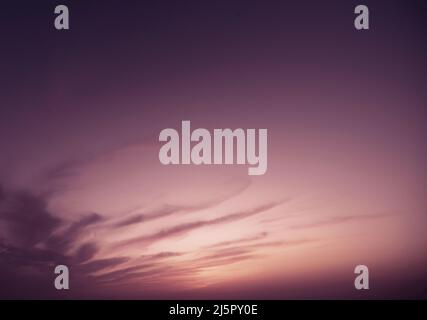 sunrise or sunset in dramatic foggy cloudy sky Stock Photo