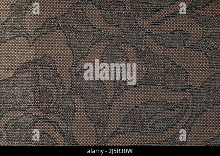 Floral old retro vintage ornament fabric in brown color on background. Cute ornament floral pattern. Background wall design. Vintage wallpaper Stock Photo