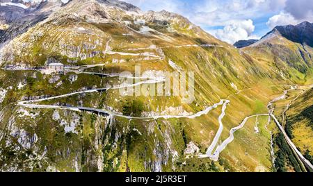 Zig-zag road to Furka Pass in the Swiss Alps Stock Photo