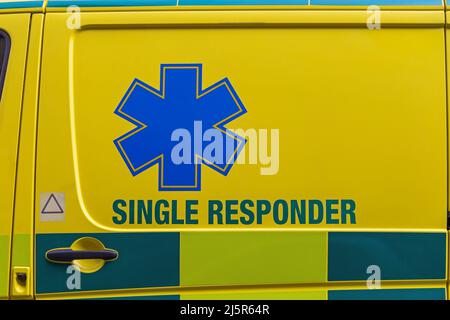 Sign Single Responder at Emergency Vehicle Ambulance Stock Photo