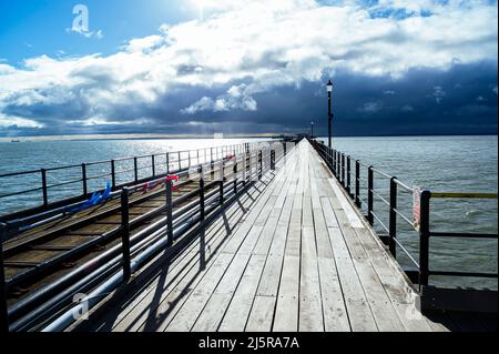 Souhtend pier with an incoming storm. Stock Photo