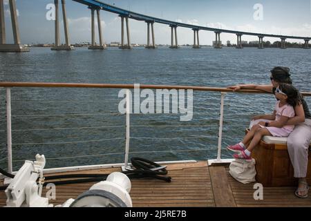 https://l450v.alamy.com/450v/2j5re7b/mother-and-child-contemplating-coronado-bridge-from-a-sightseeing-cruise-through-san-diego-south-bay-2j5re7b.jpg