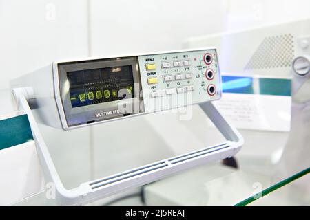 Universal portable desktop voltmeter in store Stock Photo