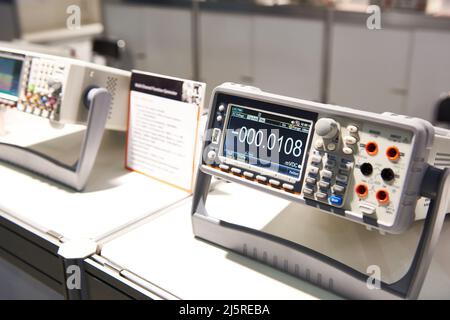 Universal portable desktop voltmeter in store Stock Photo