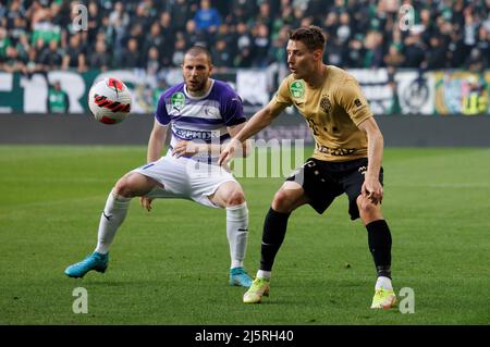 BUDAPEST, HUNGARY - APRIL 24: Yohan Croizet of Ujpest FC fights for the  ball with Adnan Kovacevic of Ferencvarosi TC during the Hungarian OTP Bank  Liga match between Ferencvarosi TC and Ujpest