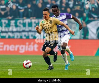 BUDAPEST, HUNGARY - APRIL 24: Yohan Croizet of Ujpest FC fights for the  ball with Adnan Kovacevic of Ferencvarosi TC during the Hungarian OTP Bank  Liga match between Ferencvarosi TC and Ujpest