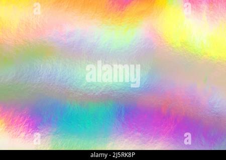 Holographic foil texture, abstract colorful trendy background. Shiny backdrop Stock Photo