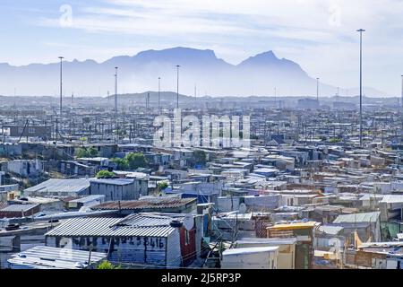 View over shacks at Khayelitsha, township / slum / shanty town on the Cape Flats in the city Cape Town / Kaapstad, Western Cape Province, South Africa Stock Photo